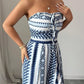 👗 47% OFF NOW! 💥 Geometric Jumpsuit with Halter Neckline & Side Slit – Unique print & elastic back – Versatile, perfect for summer parties or resort wear ✨