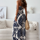 Mouwloze jumpsuit met blote schouders en wijde pijpen