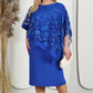 Elegante Jurk met Bloemenkant en Cape Mouwen
