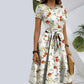 Elegante Damesjurk met Ronde Hals en Print