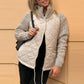 Dameswollen patchwork donsjas met pluizige voering