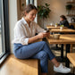 Hoge elastische broek voor dames met zakken met ritssluiting