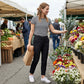 Hoge elastische broek voor dames met zakken met ritssluiting